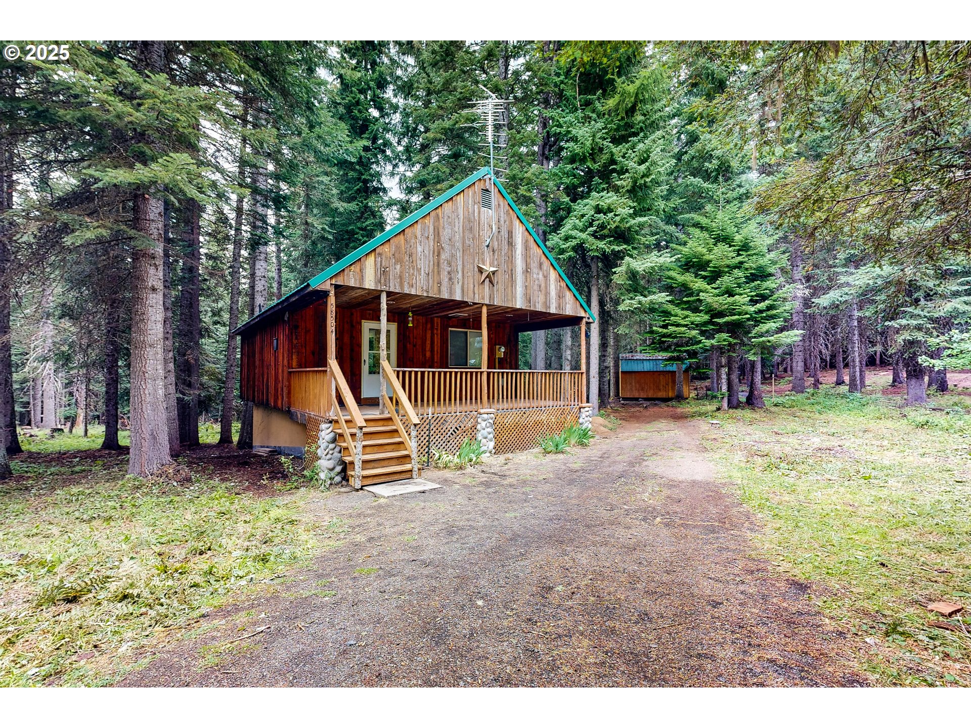 58504 Wildwood Loop Weston, OR 97886 - Photo 6 of 39 a view of a house with a yard patio and fire pit