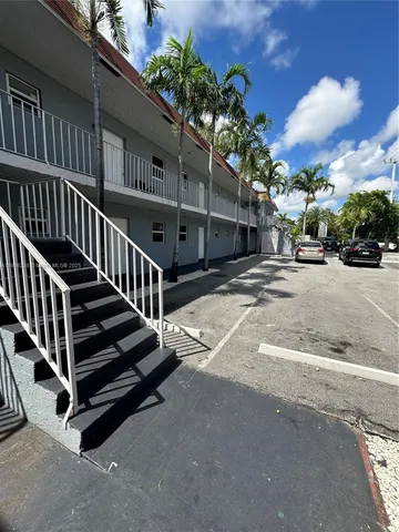 a view of a house with a garage and a garage