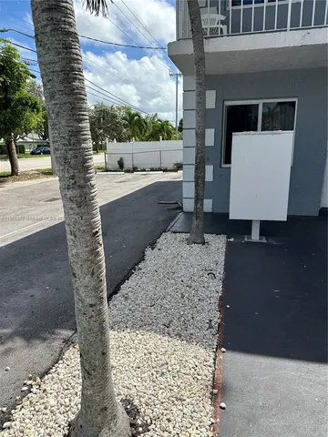 a house view with a outdoor space