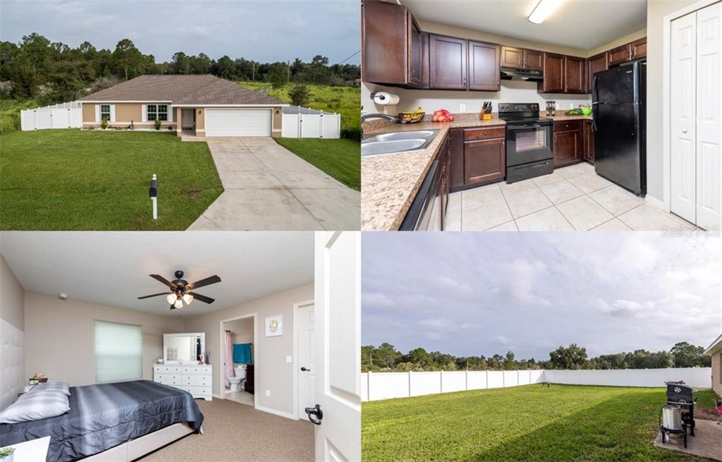a view of a kitchen with kitchen island stainless steel appliances cabinets and a counter top space