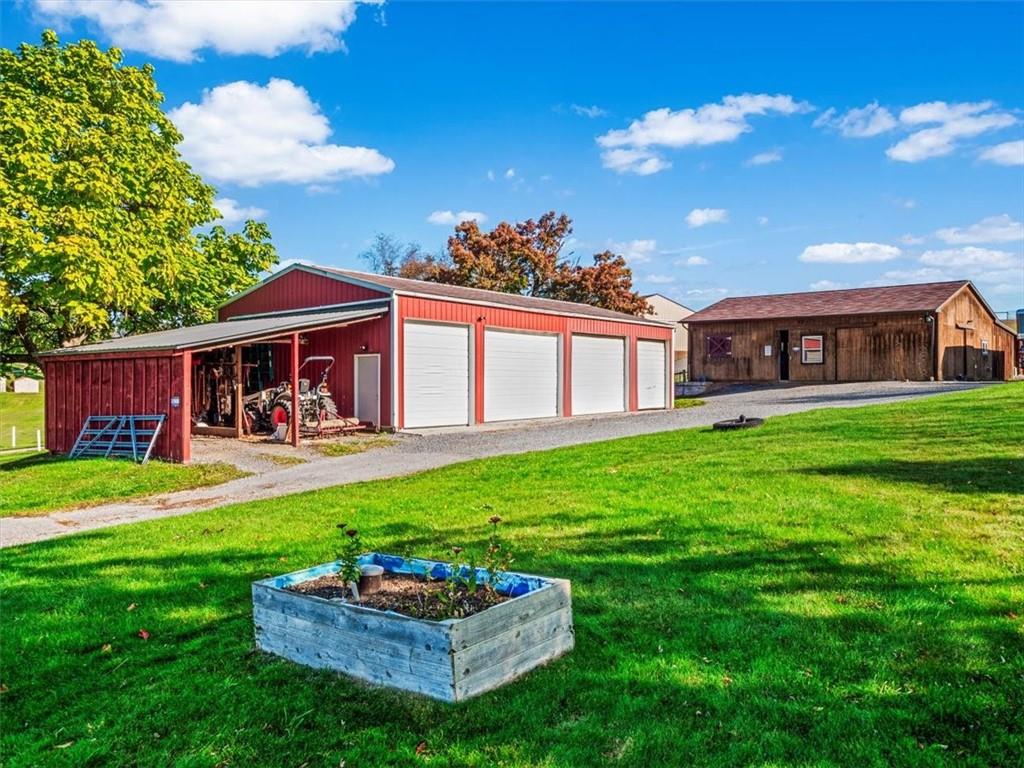 281 Bear Creek Road Sarver, PA 16055 - Photo 27 of 50 a front view of a house with a garden