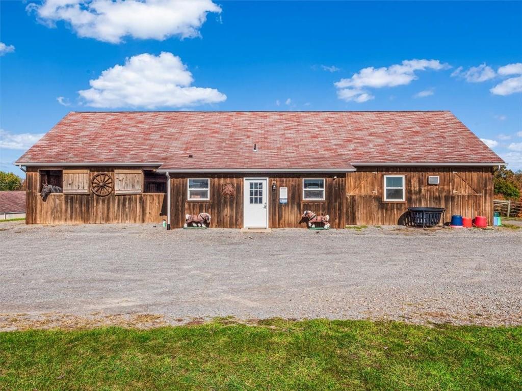 281 Bear Creek Road Sarver, PA 16055 - Photo 38 of 50 a front view of a house with a garden and yard