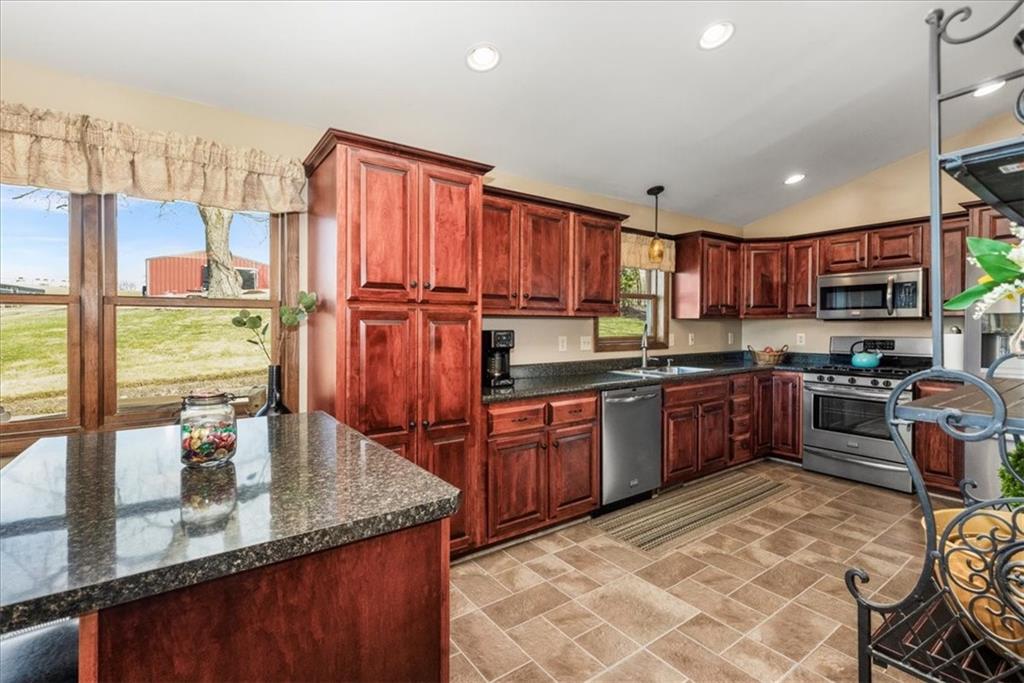 281 Bear Creek Road Sarver, PA 16055 - Photo 5 of 50 a kitchen with stainless steel appliances granite countertop a sink dishwasher stove and refrigerator