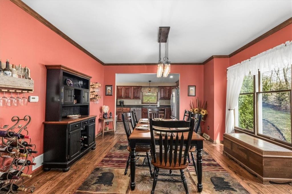 281 Bear Creek Road Sarver, PA 16055 - Photo 9 of 50 a view of a dining room with furniture window and wooden floor