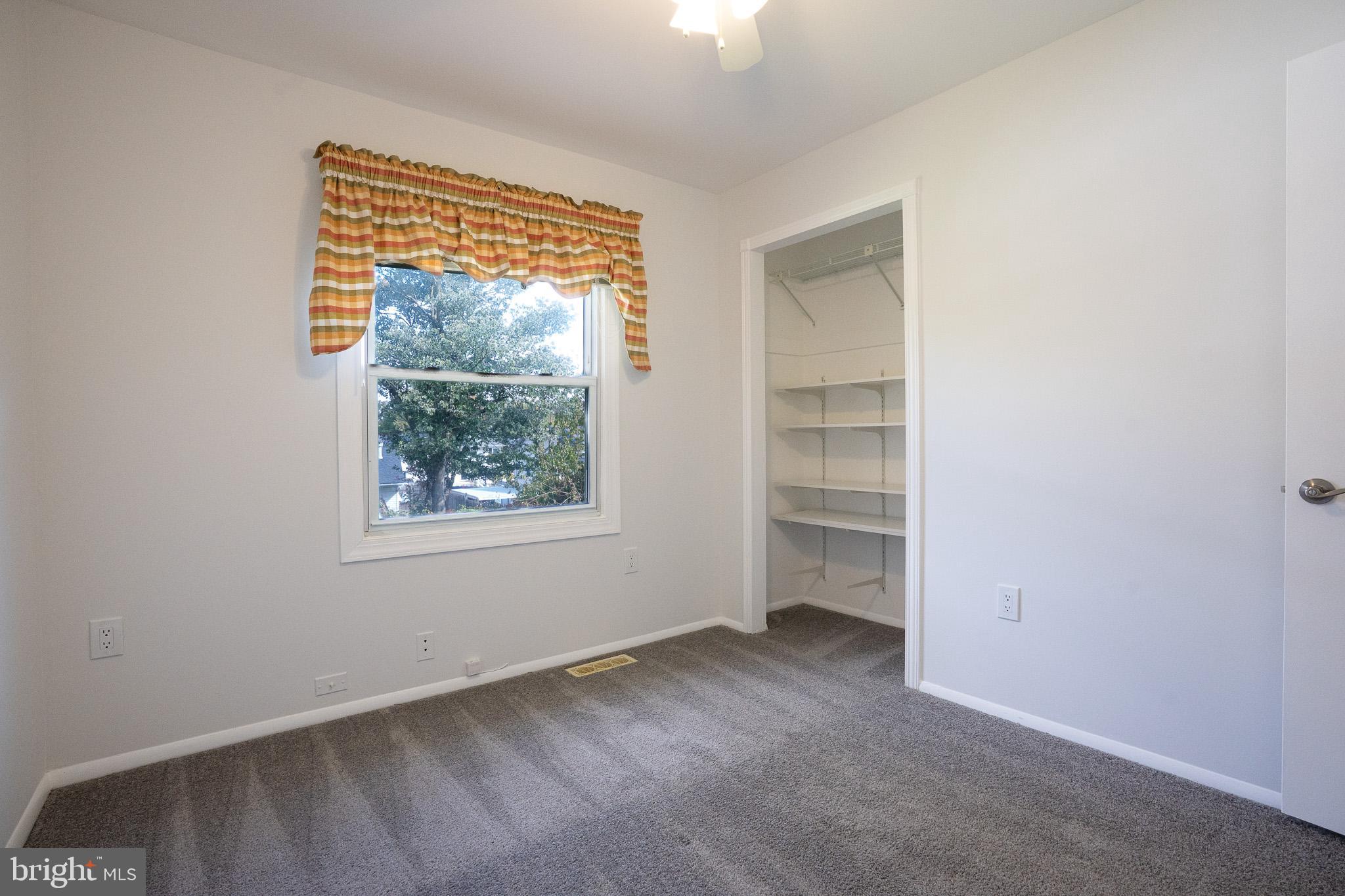 1318 Wickell Road Odenton, MD 21113 - Photo 13 of 23 an empty room with a window