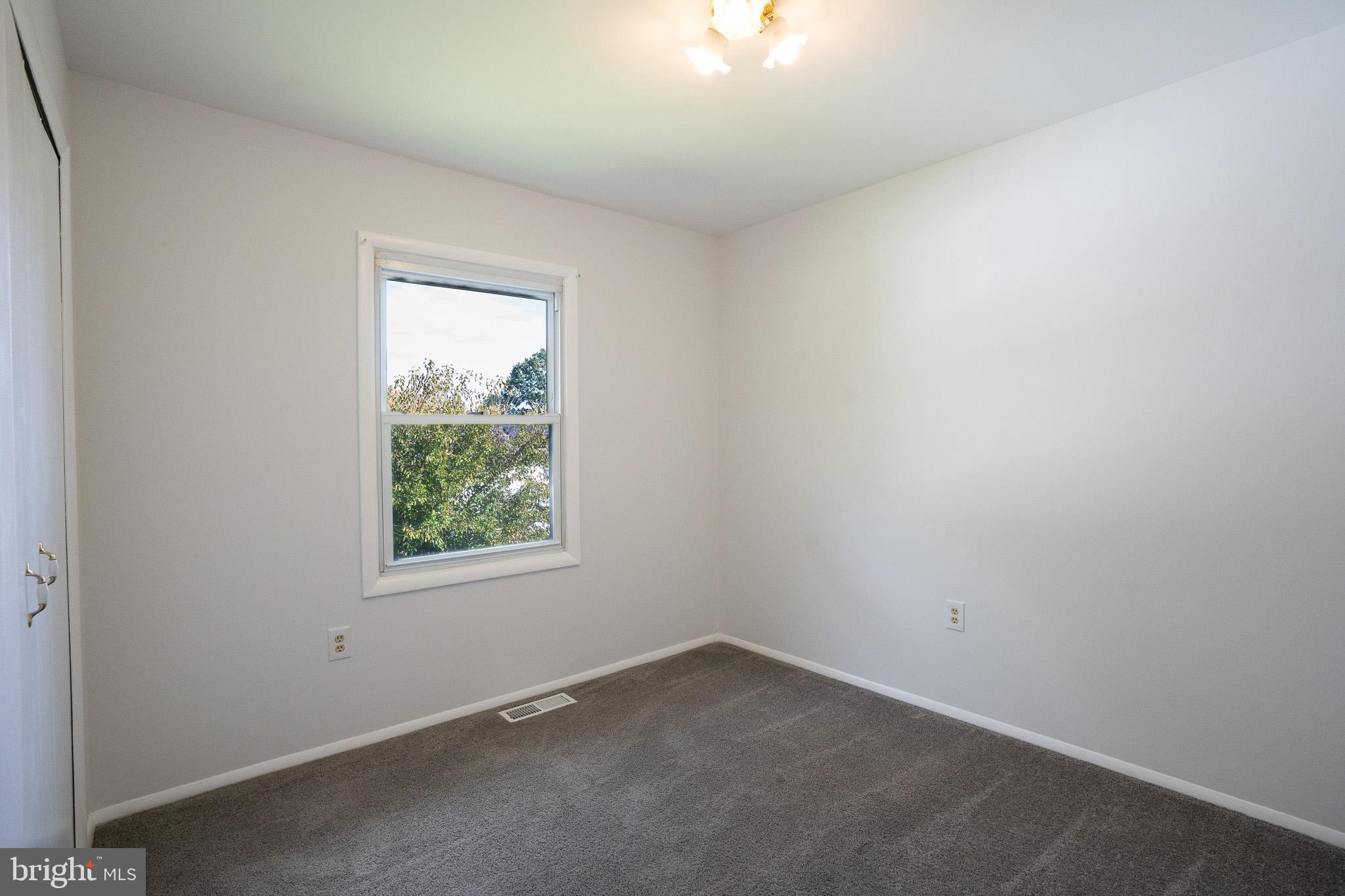 1318 Wickell Road Odenton, MD 21113 - Photo 19 of 23 an empty room with a window