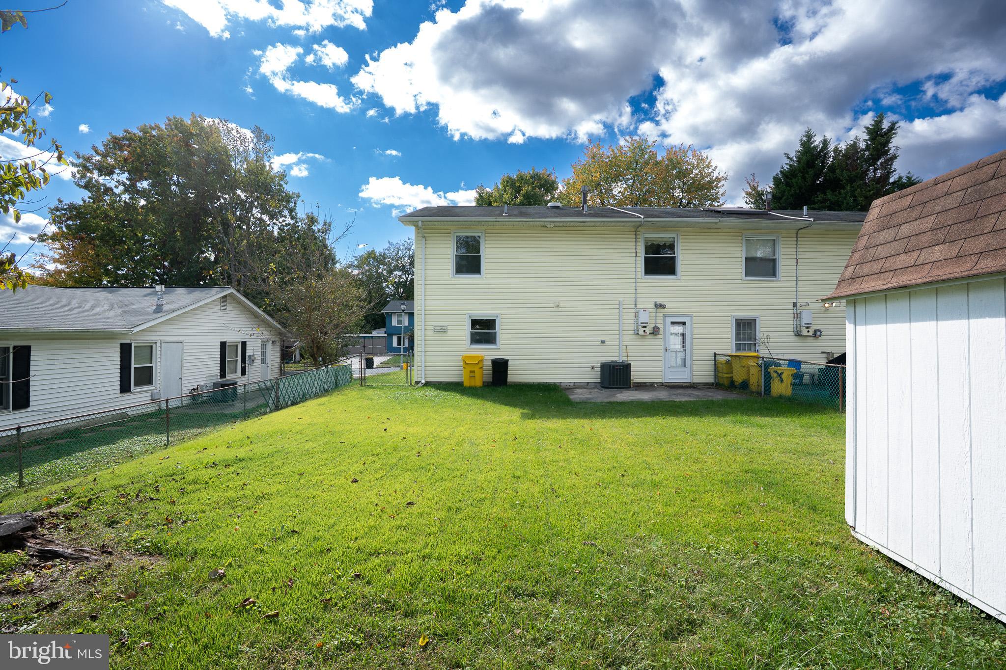 1318 Wickell Road Odenton, MD 21113 - Photo 21 of 23 a view of a house with backyard