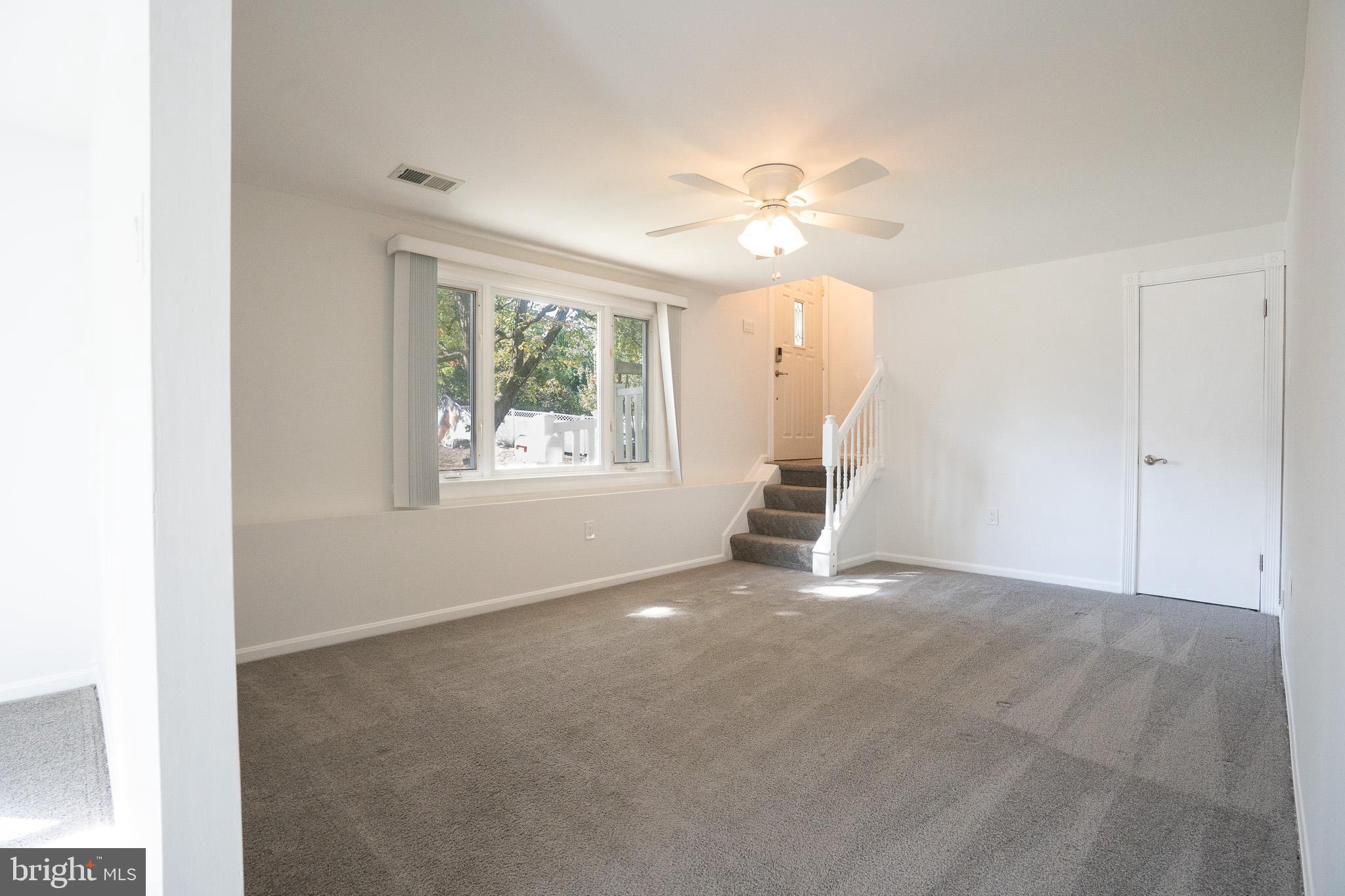 1318 Wickell Road Odenton, MD 21113 - Photo 4 of 23 a view of an empty room with a window