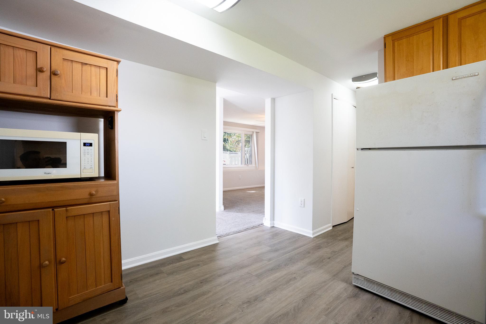 1318 Wickell Road Odenton, MD 21113 - Photo 8 of 23 a view of kitchen with wooden floor