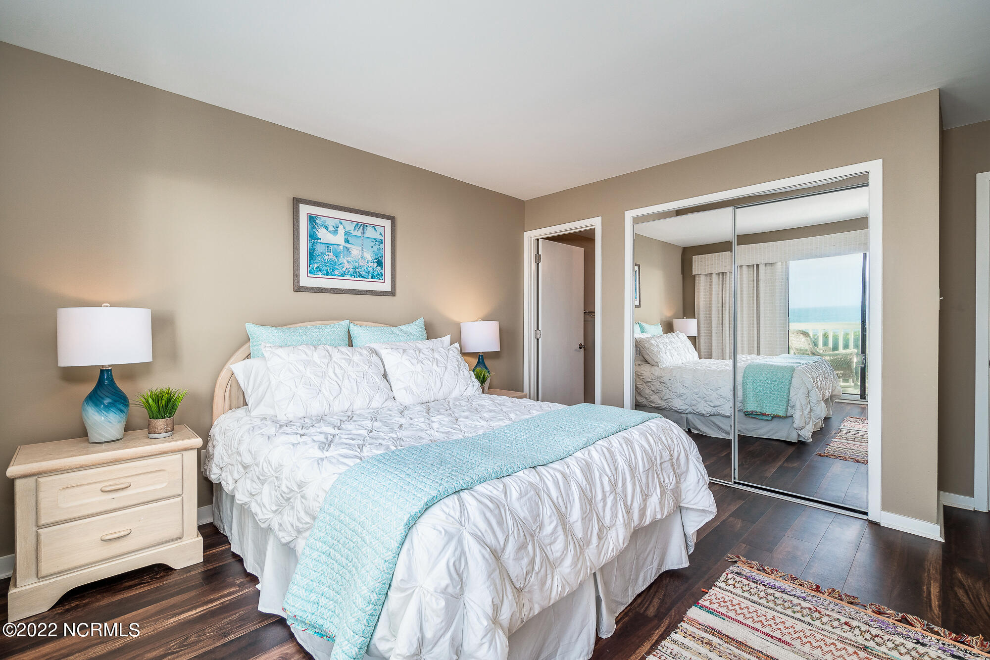 525 Salter Path Road, Unit A4 Atlantic Beach, NC 28512 - Photo 22 of 37 Primary bedroom suite