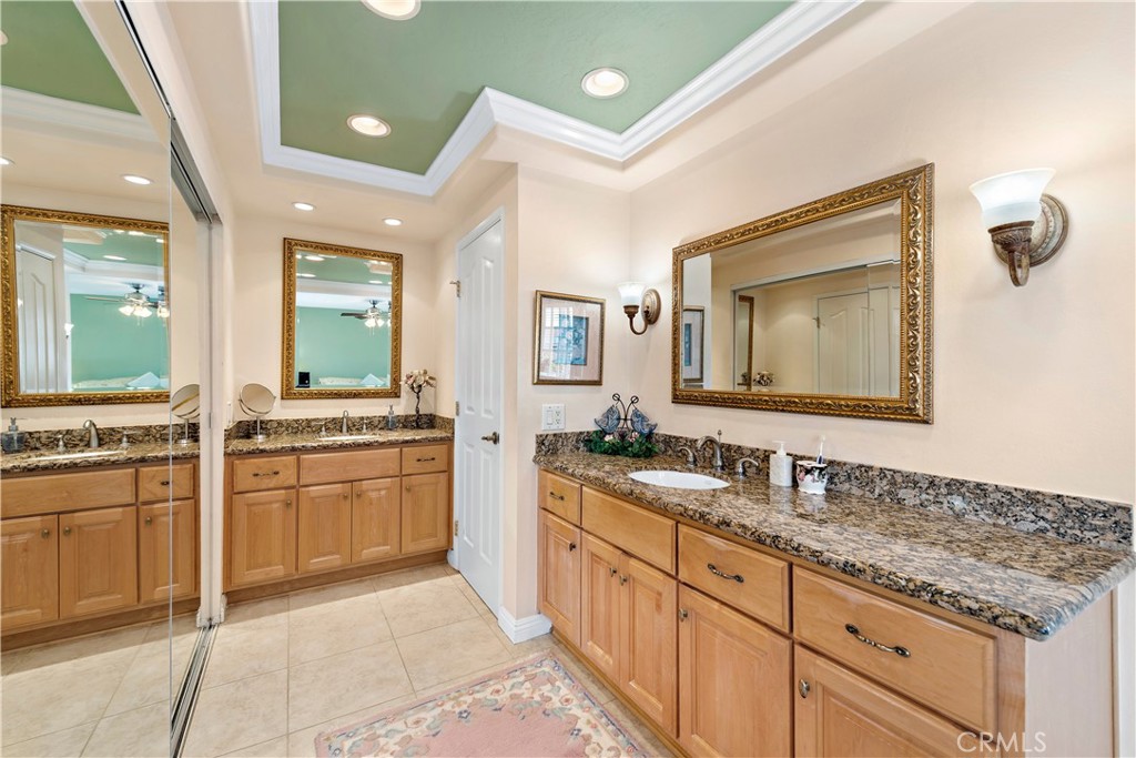 1205 Via Catalina San Clemente, CA 92672 - Photo 15 of 42 a spacious bathroom with a granite countertop sink mirror and bathtub