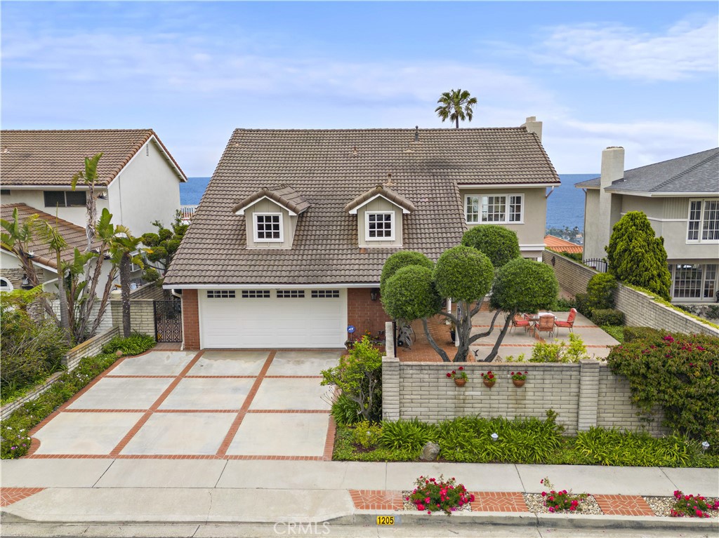 1205 Via Catalina San Clemente, CA 92672 - Photo 2 of 42 a front view of house with yard and green space