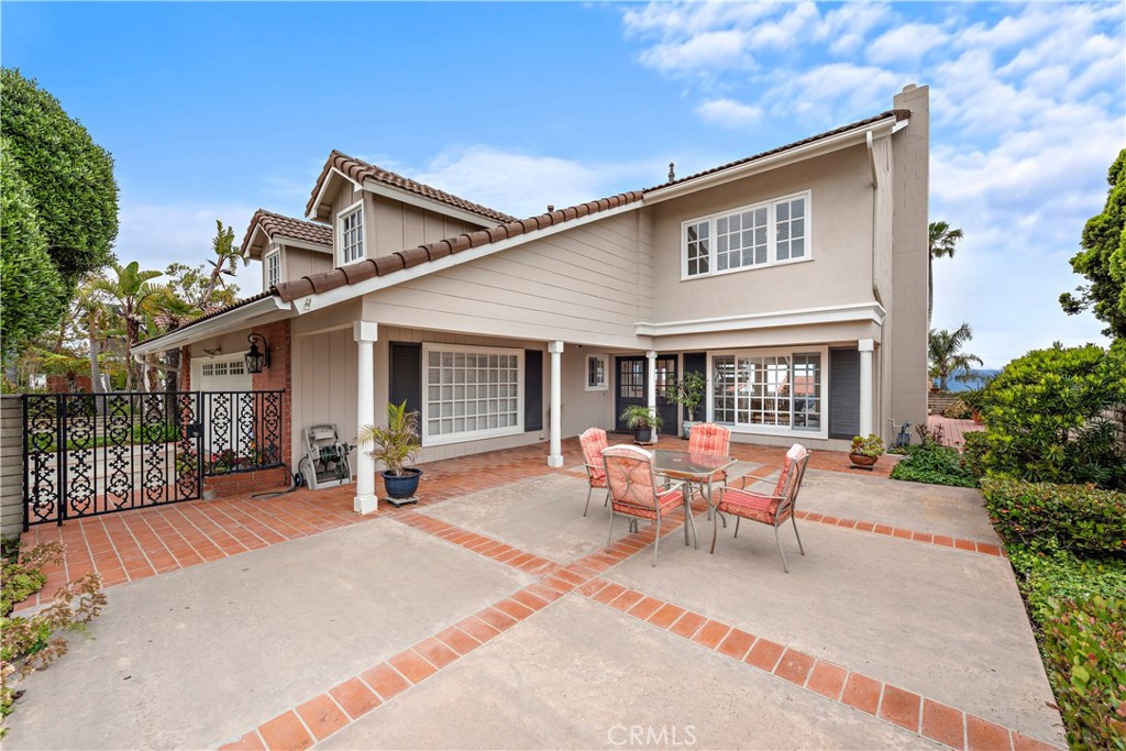 1205 Via Catalina San Clemente, CA 92672 - Photo 31 of 42 a backyard of a house with yard fire pit and outdoor seating