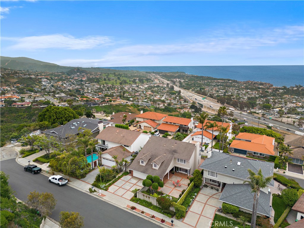 1205 Via Catalina San Clemente, CA 92672 - Photo 36 of 42 an aerial view of a city with lots of residential buildings and mountain view in back
