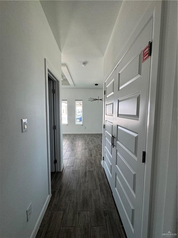 5601 Ozark Avenue, Unit 3 Mission, TX 78573 - Photo 4 of 12 a view of hallway with wooden floor