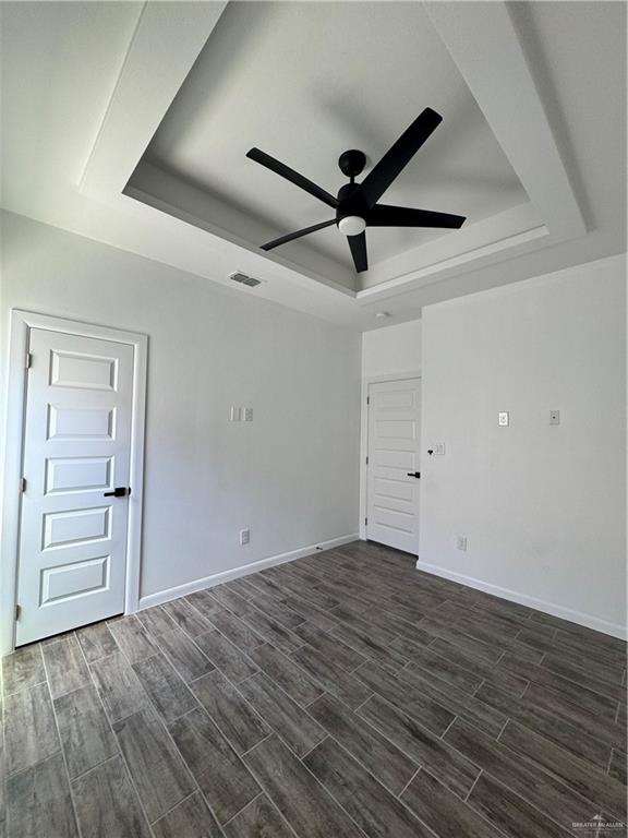 5601 Ozark Avenue, Unit 3 Mission, TX 78573 - Photo 7 of 12 wooden floor in an empty room