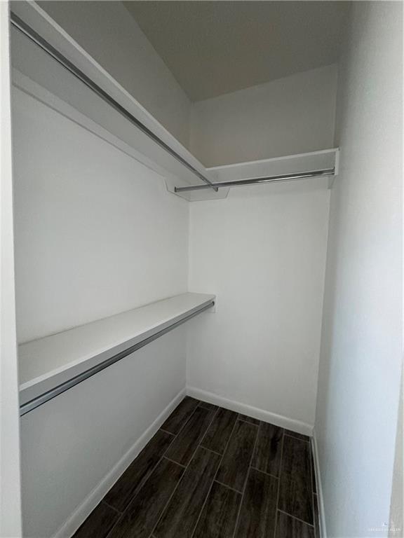 5601 Ozark Avenue, Unit 3 Mission, TX 78573 - Photo 8 of 12 a view of an empty walk in closet
