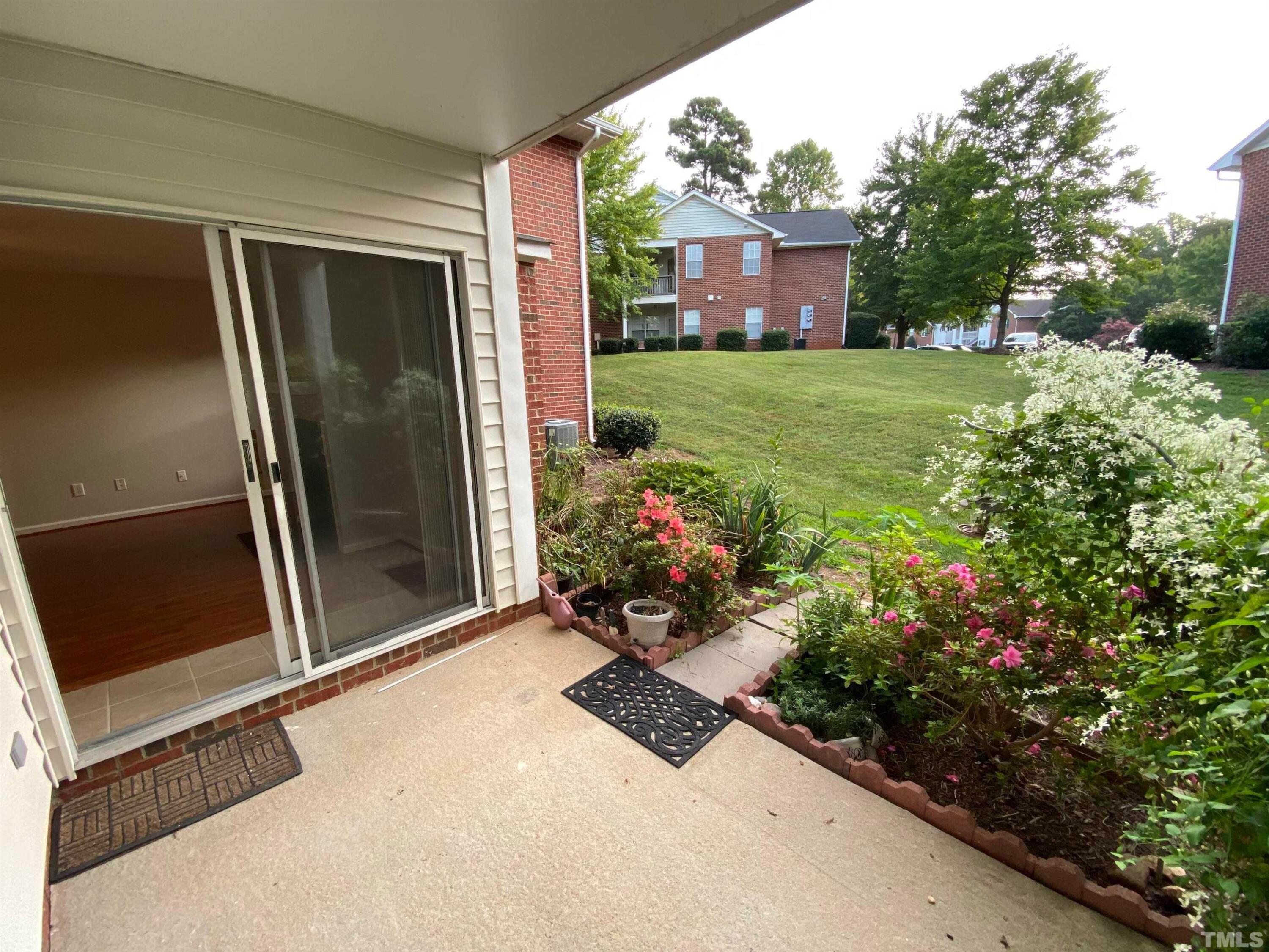 2413 Wellington Ridge Loop, Unit 2413 Cary, NC 27518 - Photo 29 of 30 a view of a backyard with garden