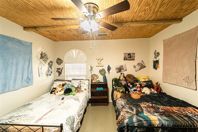 a bathroom with a double vanity sink a mirror and a shower