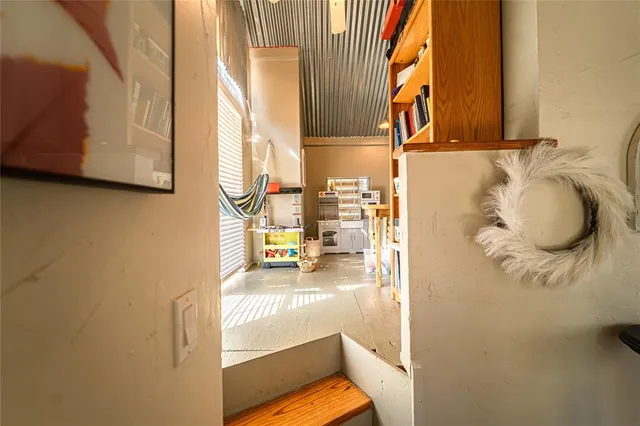 a view of a backyard with sitting area