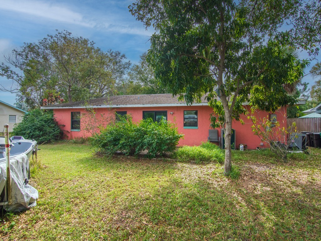 7506 Donlon Road Fort Pierce, FL 34951 - Photo 17 of 23 front view of a house with yard