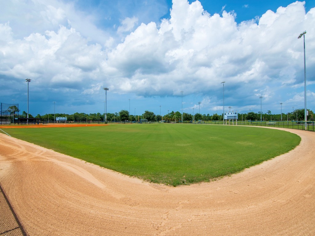 7506 Donlon Road Fort Pierce, FL 34951 - Photo 21 of 23 a view of a golf course with a garden