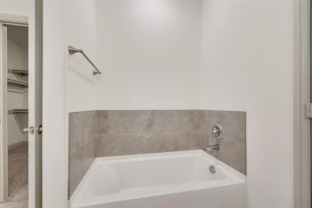 a bathroom with a bathtub