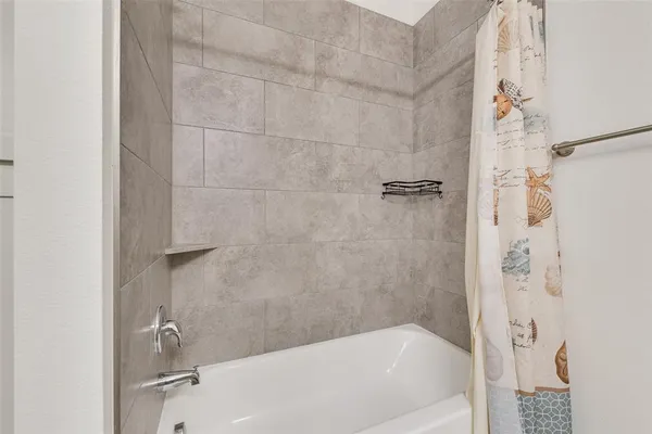 a bathroom with a bathtub