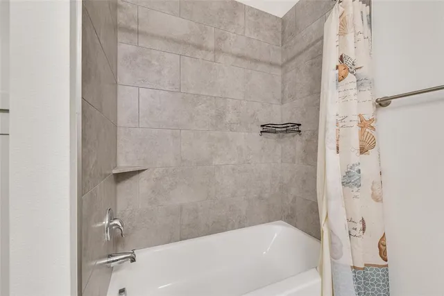 a bathroom with a bathtub