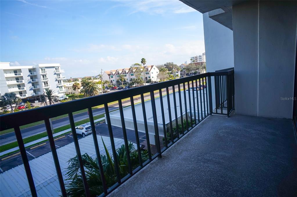 400 Island Way, Unit 308 Clearwater, FL 33767 - Photo 7 of 32 a view of city from a balcony