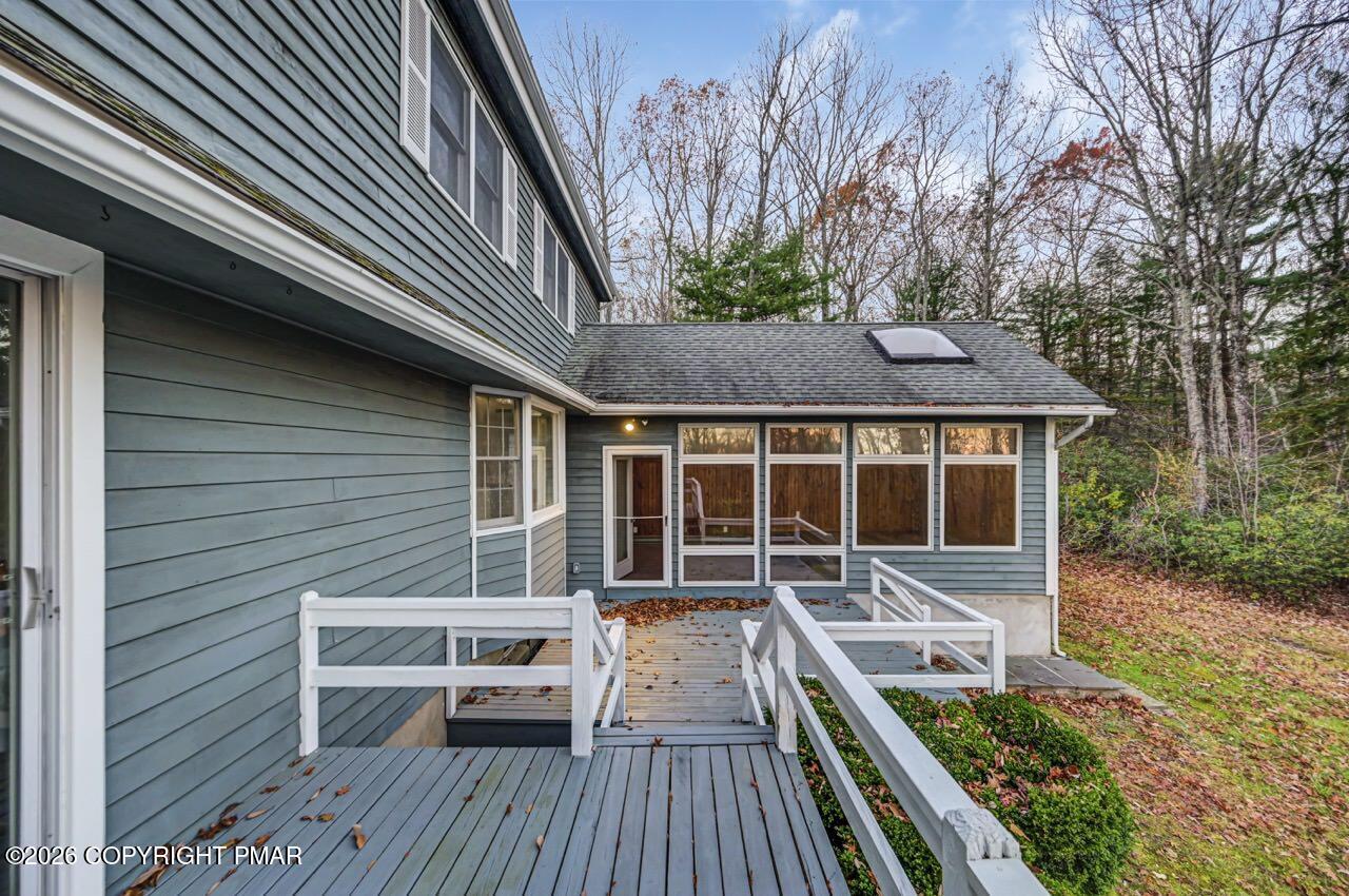 384 Devils Hole Road Cresco, PA 18326 - Photo 80 of 97 a view of house with a deck and furniture
