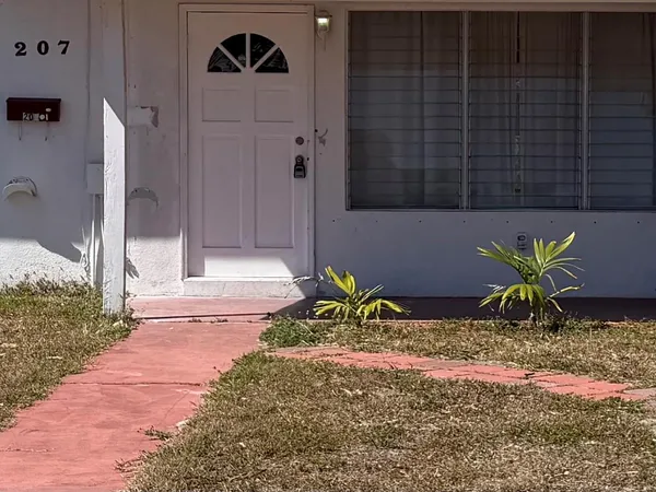 a view of a entryway door of the house
