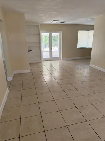 a view of an empty room and window