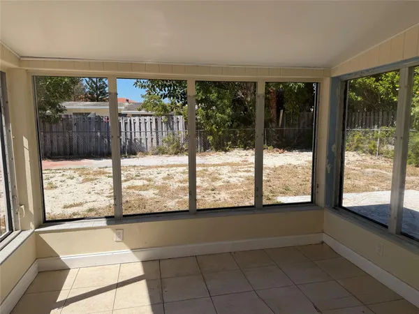 a view of a large window with an outdoor space