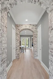 a house view with a sitting space and garden