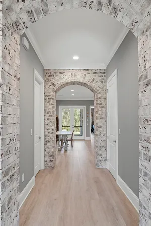 a house view with a sitting space and garden
