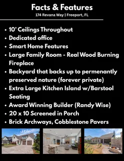 a living room with fireplace furniture and a large window