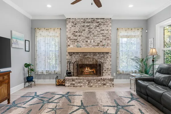 a view of a swimming pool with a lawn chairs