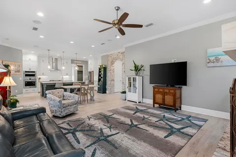 a view of swimming pool with outdoor seating and city view