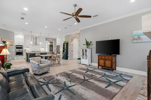 a view of swimming pool with outdoor seating and city view