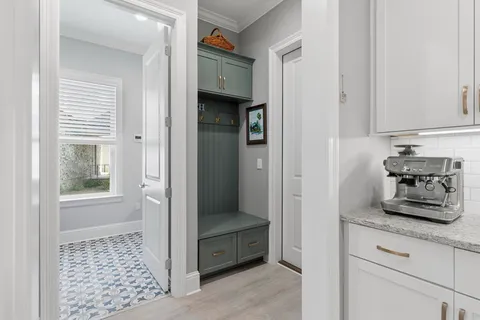 an aerial view of a house with a swimming pool