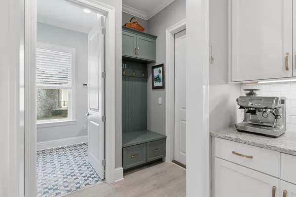 an aerial view of a house with a swimming pool