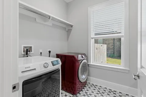 a view of a swimming pool with a chairs