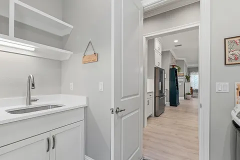 an aerial view of a house with a ocean view