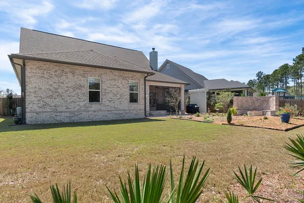 a bathroom with a toilet a sink and a mirror