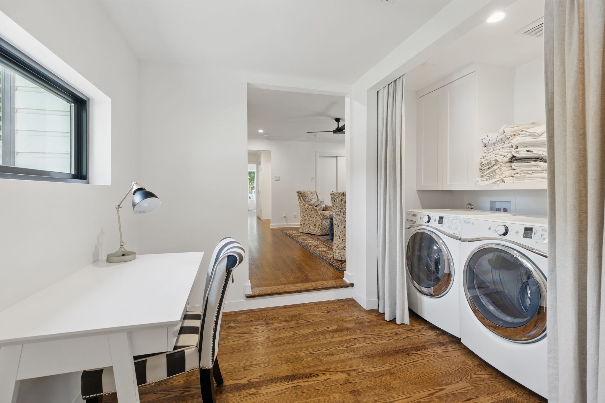 6010 Nasco Drive Austin, TX 78757 - Photo 17 of 34 a view of a dining room with furniture and a chandelier