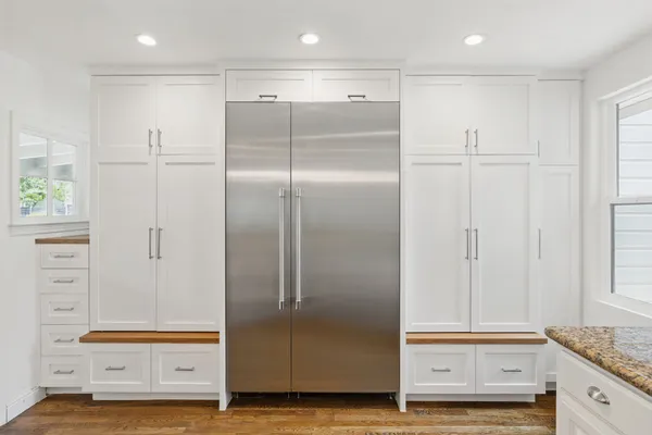 a bathroom with a shower and a sink