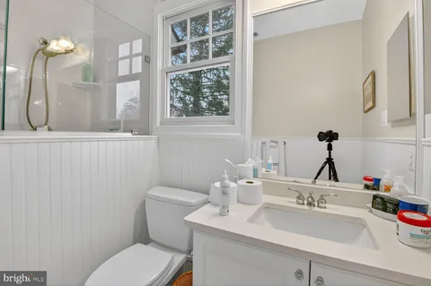 a bathroom with a sink and a toilet