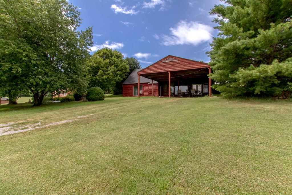 4314 Kinneys Road Springfield, TN 37172 - Photo 2 of 28 a front view of a house with yard and trees