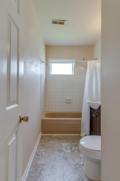 4314 Kinneys Road Springfield, TN 37172 - Photo 21 of 28 a bathroom with a sink a toilet and tub